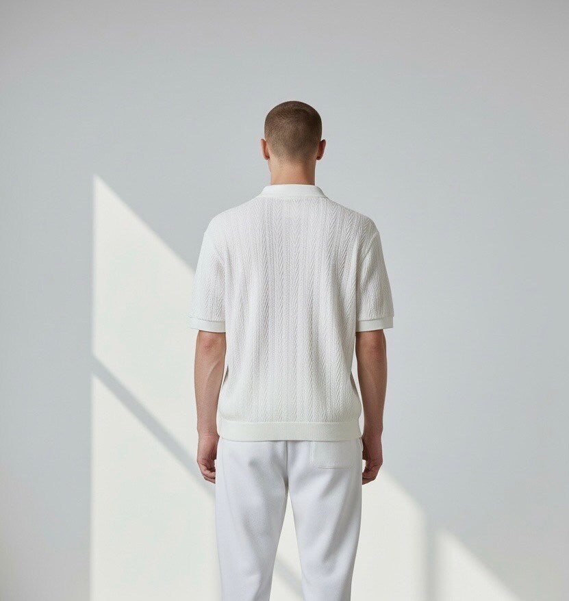 Men's textured polo with subtle vertical pattern